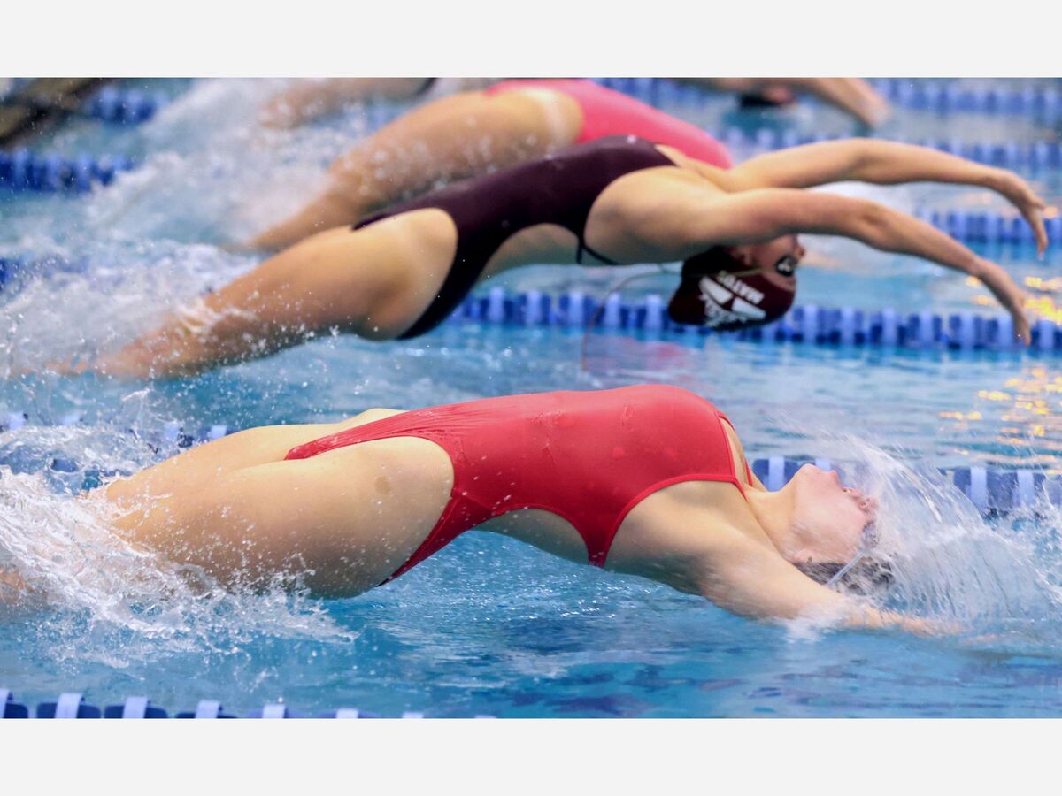Caroline Klein opens the 200 medley relay with the backstroke.