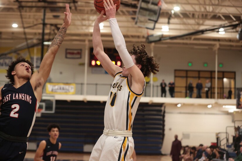 BASKETBALL Sanderson, Fidh Lead Saline to Win Over East Lansing The