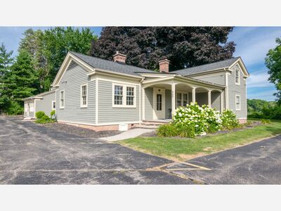 Wow - you can own a piece of Saline history!  Check out this beautiful, updated historic home on Mill Pond!