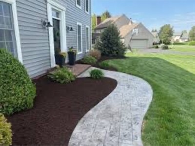 Weeding out garden beds mulch 