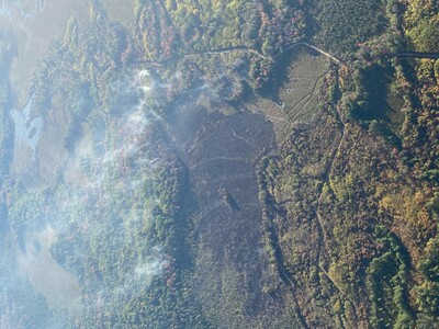 Firefighters working to contain wildfire near Houghton Lake; public urged to use caution amid extreme fire danger