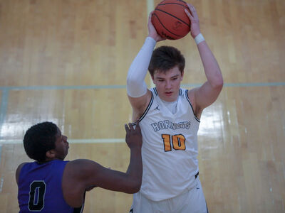 BASKETBALL: Evans Goes 'Beastmode' as Saline Stuns Pioneer