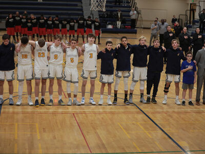 Gallery: Saline Boys Basketball Team Rebounds to Win Home Opener
