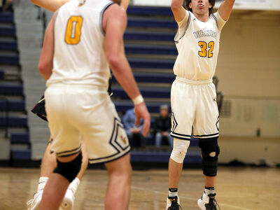 BASKETBALL: Arico Scores 29 as Saline Defeats Lincoln to Open District