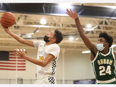 BASKETBALL: Saline Varsity Falls to Lincoln, JV and Freshman Netters Win