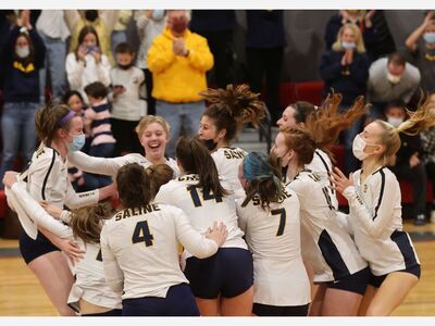 VOLLEYBALL: Saline Downs Bedford to Win Its First District Trophy Since 2016.
