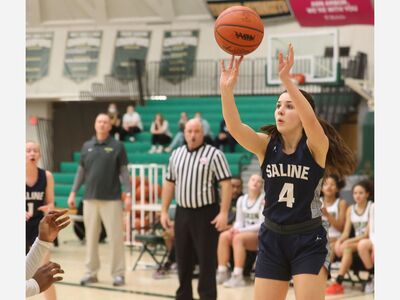BASKETBALL: Saline Girls Begin The Playoffs With a Win Against Huron