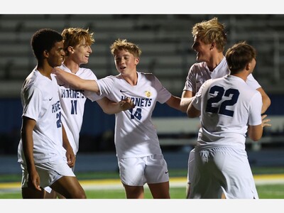 SOCCER: 'Greek Gods' Lead Hornets to Regional Final