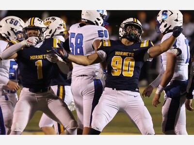 FOOTBALL: Saline Opens Playoffs With Big Win