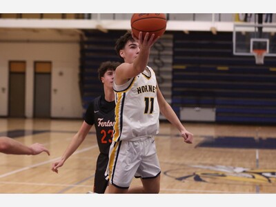 BASKETBALL: Saline Takes Down Skyline on the Road