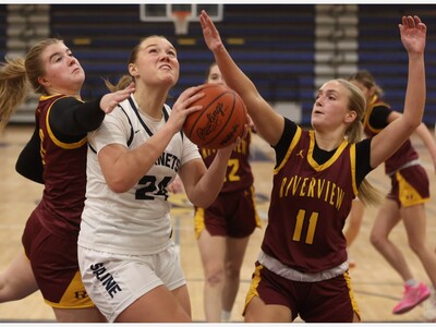 BASKETBALL: Backus Leads Saline to 54-41 Win Over Woodhaven
