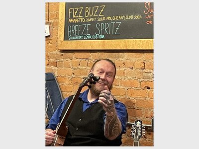 Carrigan Cafe hosts: Afternoon Music w/ Banjo Mike Evans